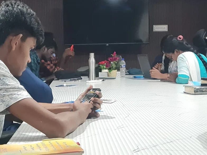 Man focused on learning with headphones and laptop